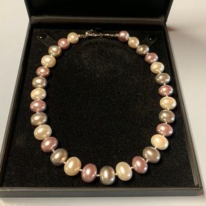 Lovely large pastel pearl necklace.